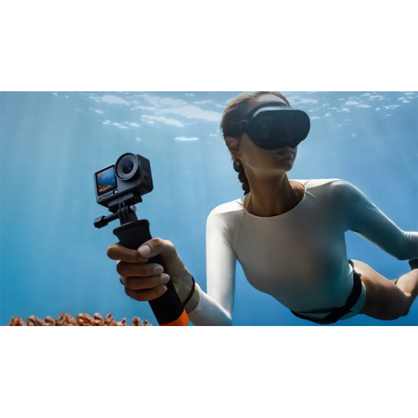 camera submerged with diver