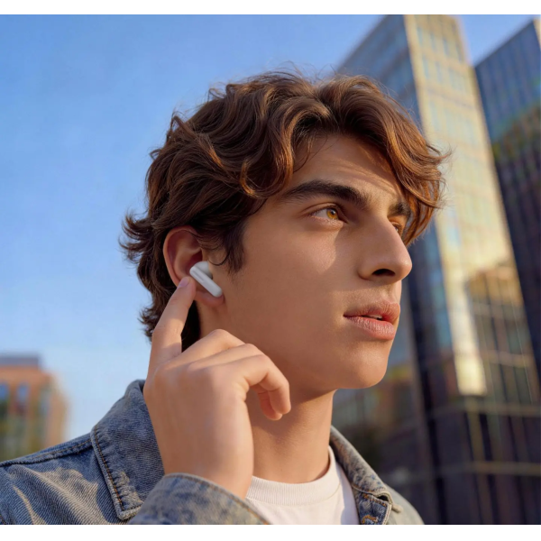 person using the earbuds